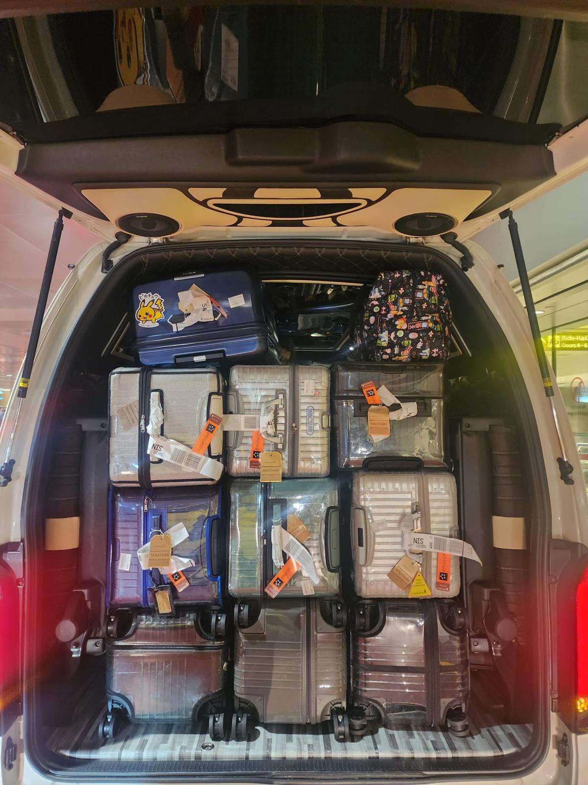 Loaded luggage bay for airport transfer